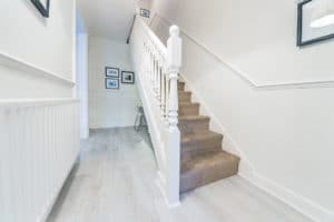 Straight Stair in a new build house hallway with balustrade